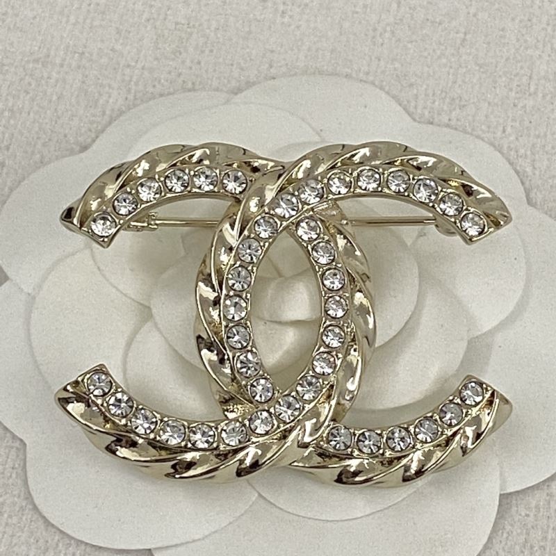 Ch*el brooches